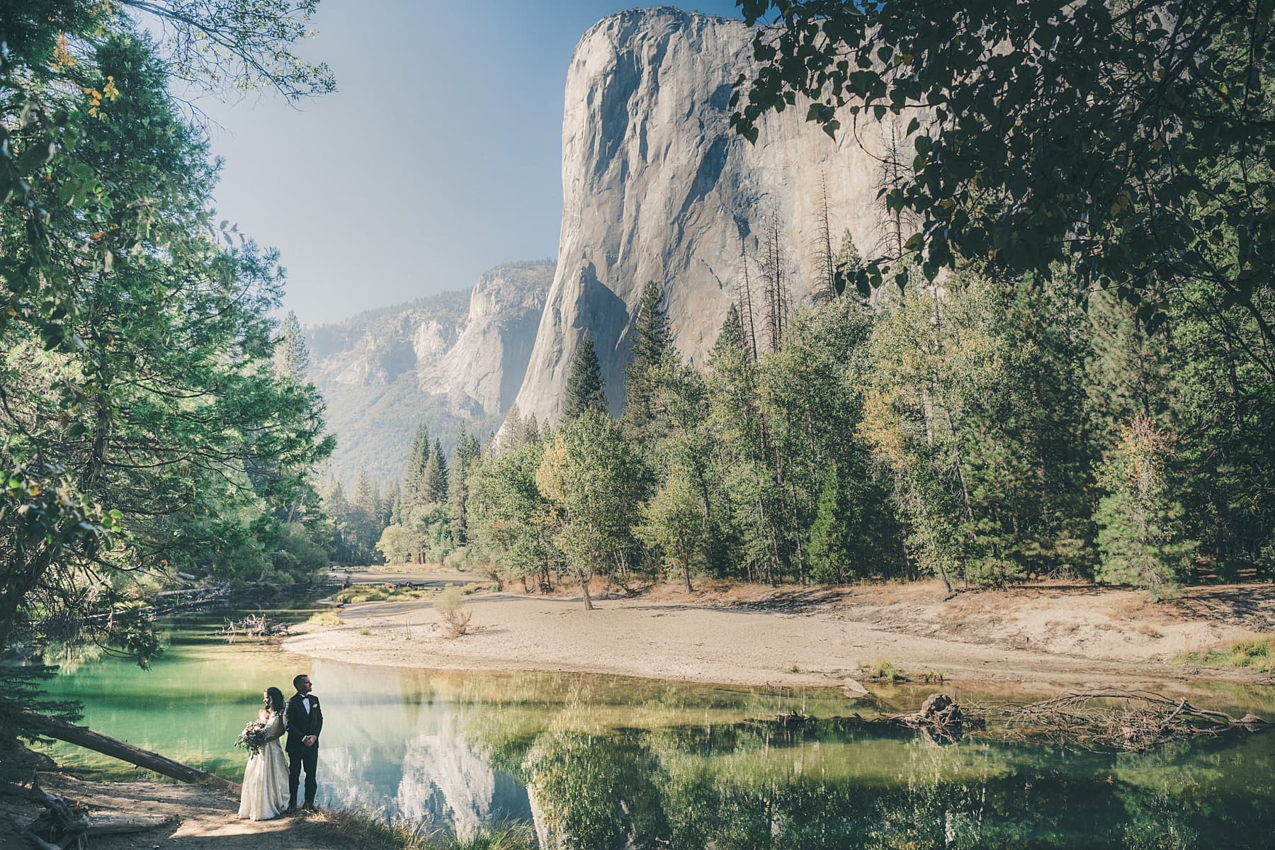 Yosemite wedding couple with Half Dome backdrop at sunset