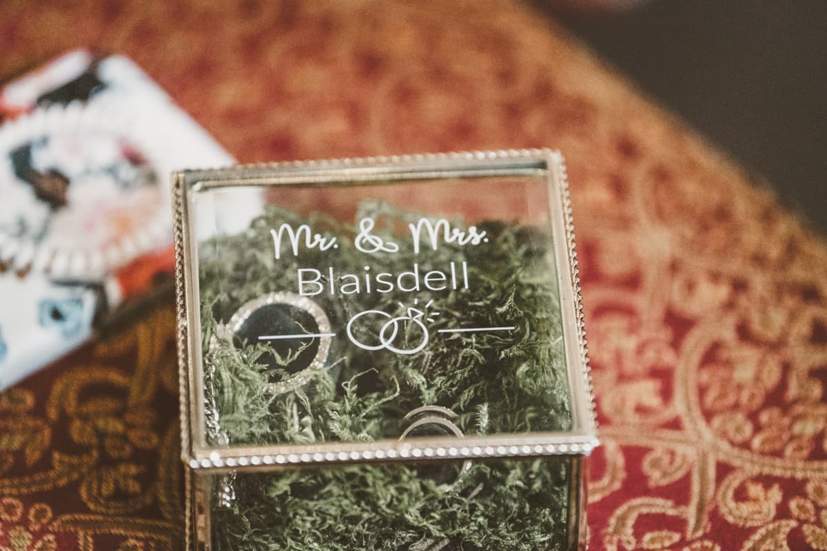 Intimate Telluride wedding couple in mountain meadow with wildflowers