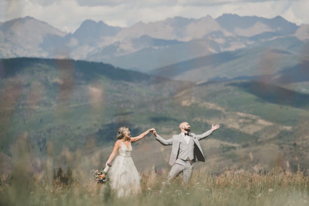 Beaver Creek Colorado wedding couple at ski resort with mountain backdrop