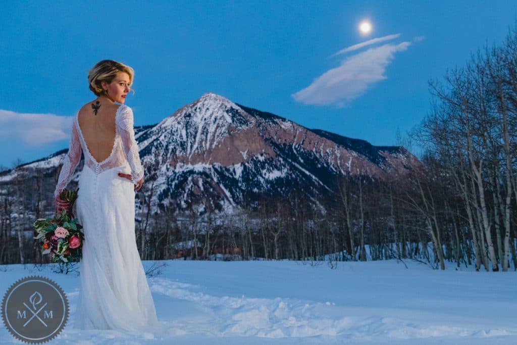Crested Butte Colorado winter wedding couple with Elk Mountain backdrop