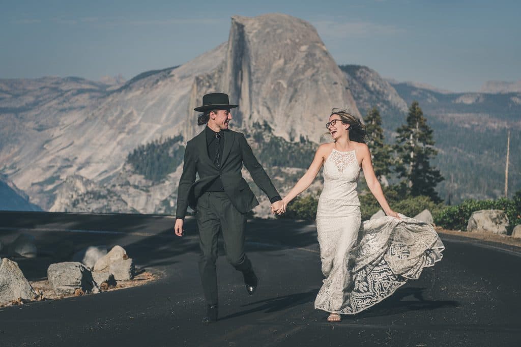 Glacier Point Yosemite wedding couple with Half Dome and High Sierra backdrop