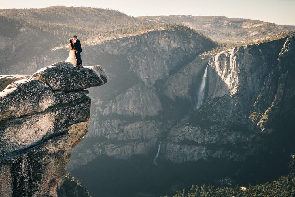 Yosemite Glacier Point wedding couple at sunset with dramatic valley views