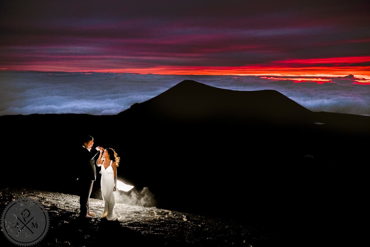 Hawaii elopement couple on a tropical beach at sunrise