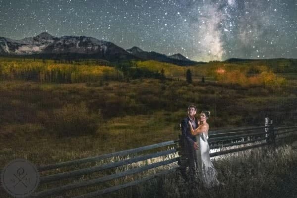 Yosemite elopement couple at Tunnel View with Half Dome and valley backdrop