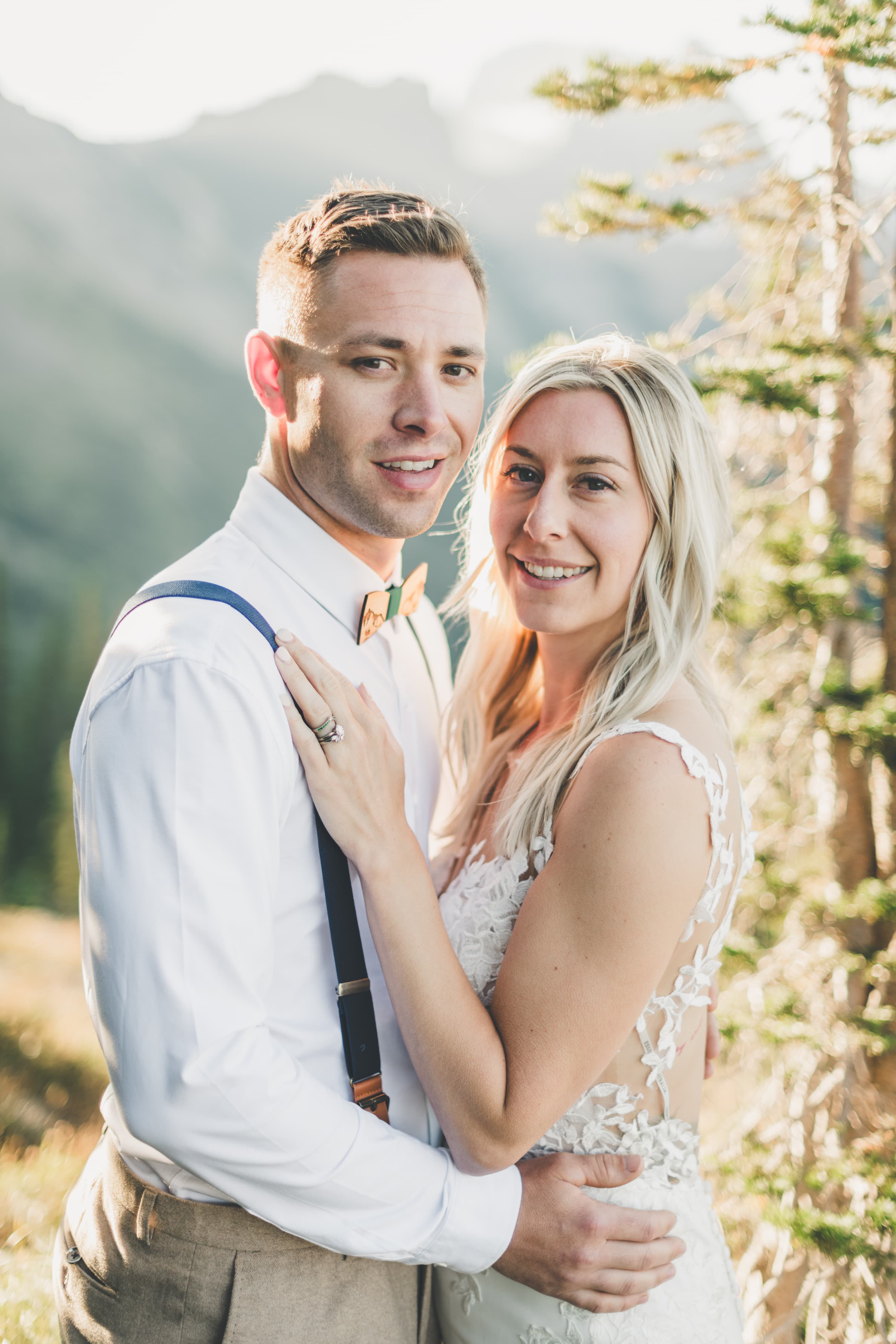 Close portrait of Shawna and Ryan in the late golden light above Glacier National Park