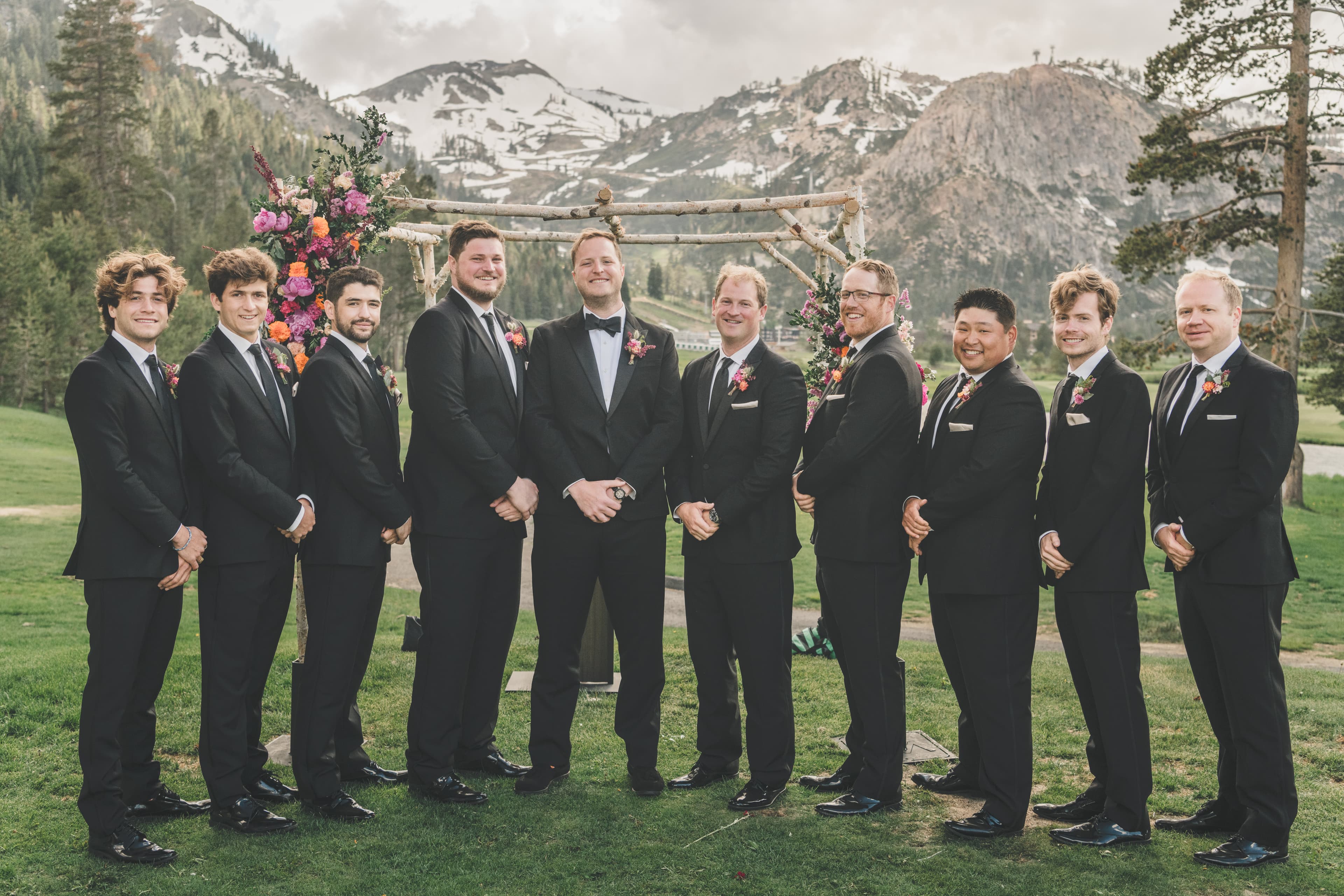 Will and his nine groomsmen lined up at the ceremony arbor with the Palisades peaks behind them