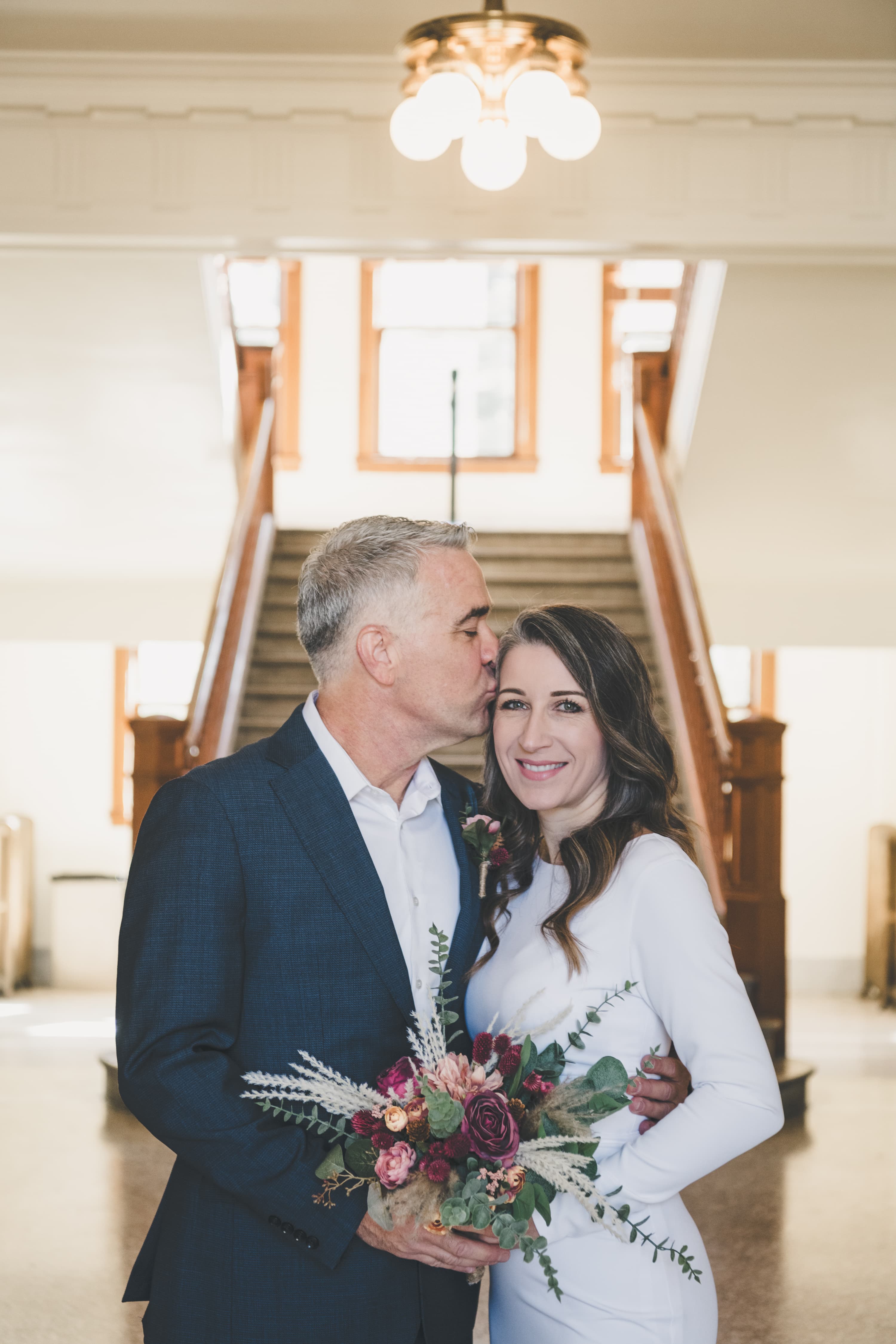 Chrishna and Scott Mammoth elopement — candid moment with Eastern Sierra scenery