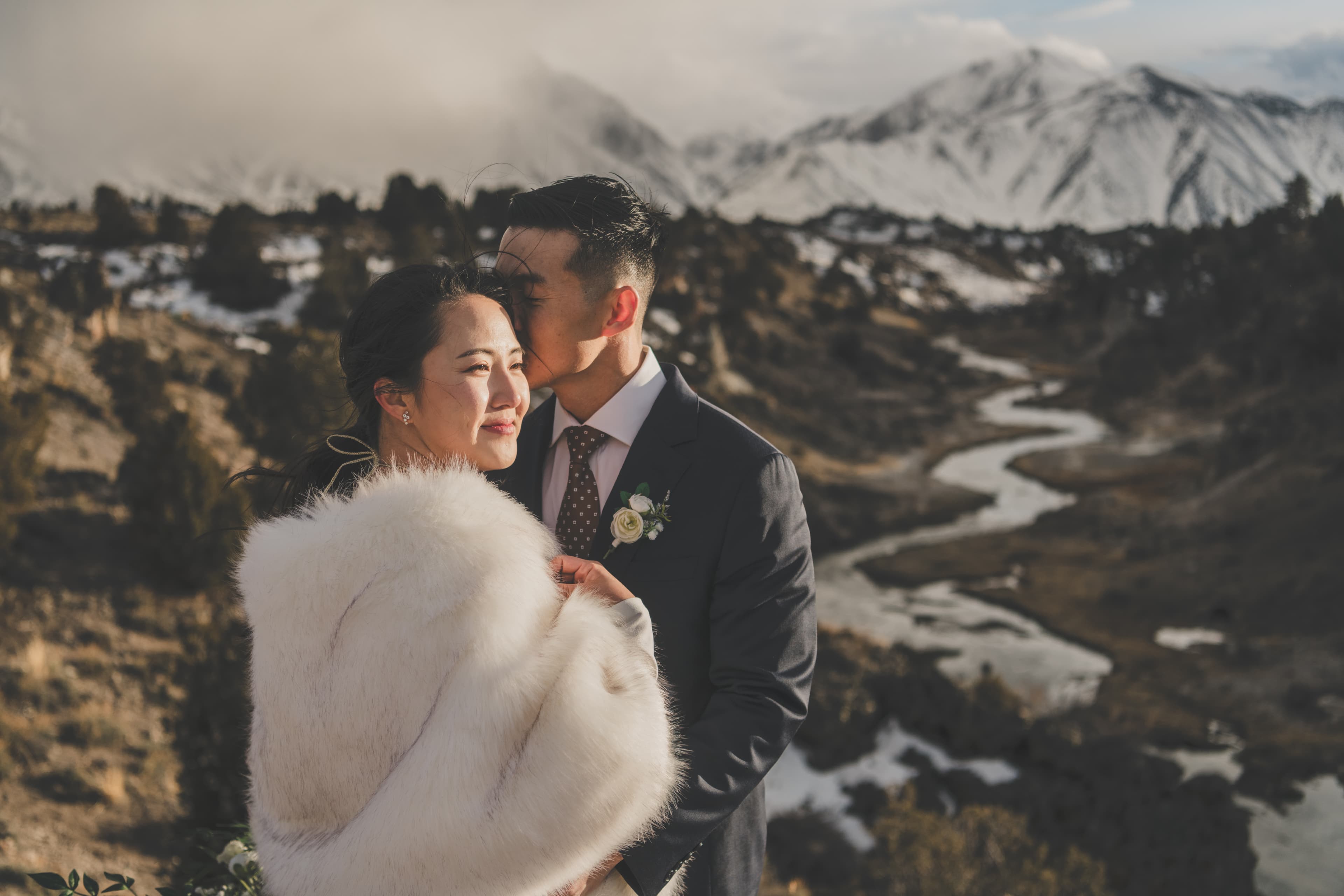 Hana and Chris Mammoth wedding — intimate moment with mountain backdrop