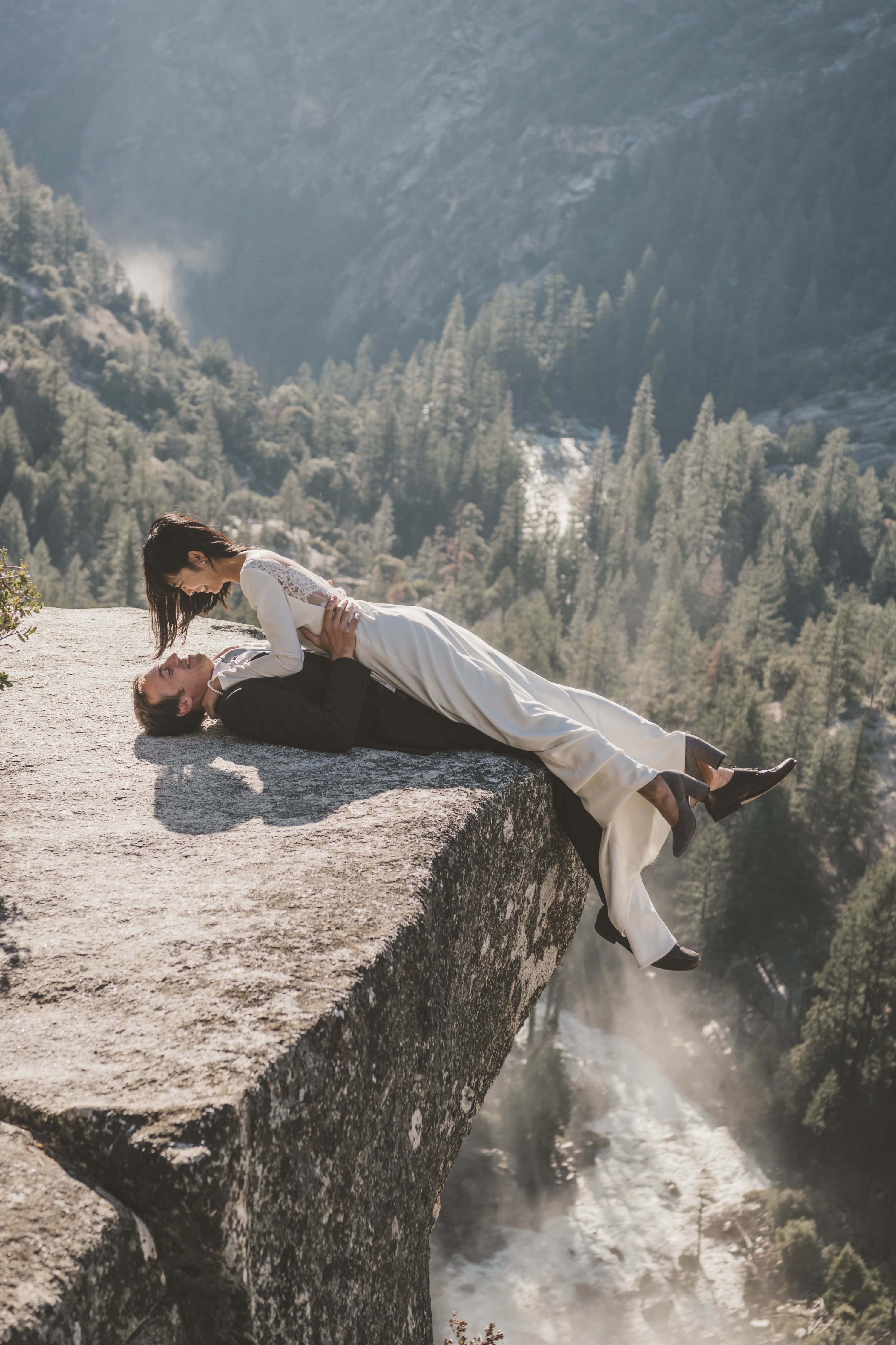 Sheri and Matt elopement in Yosemite — candid moment with valley backdrop