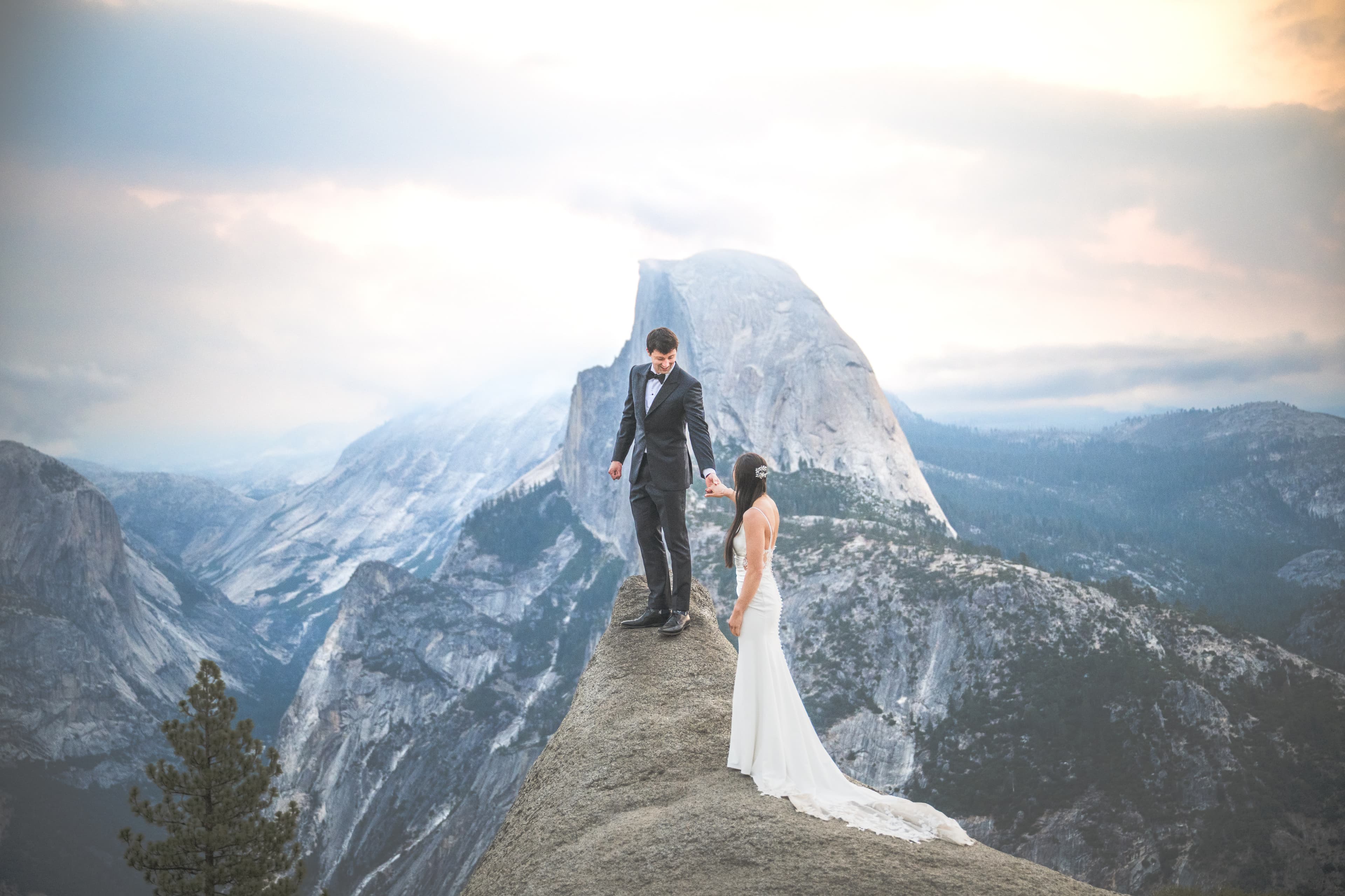 Yuleen and James Yosemite elopement — candid moment with Sierra Nevada scenery