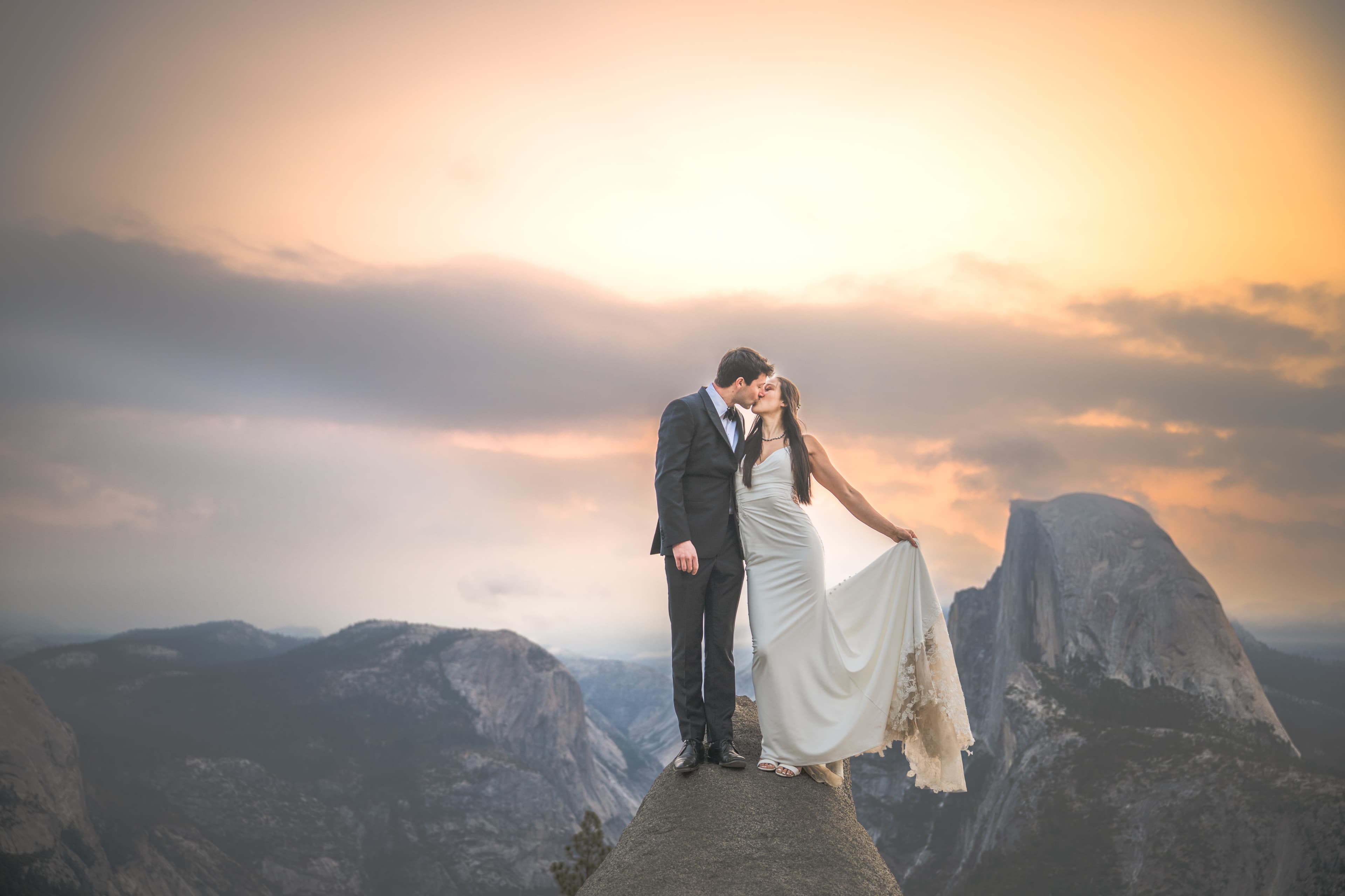 Yuleen and James elopement in Yosemite — couple with granite and pine backdrop