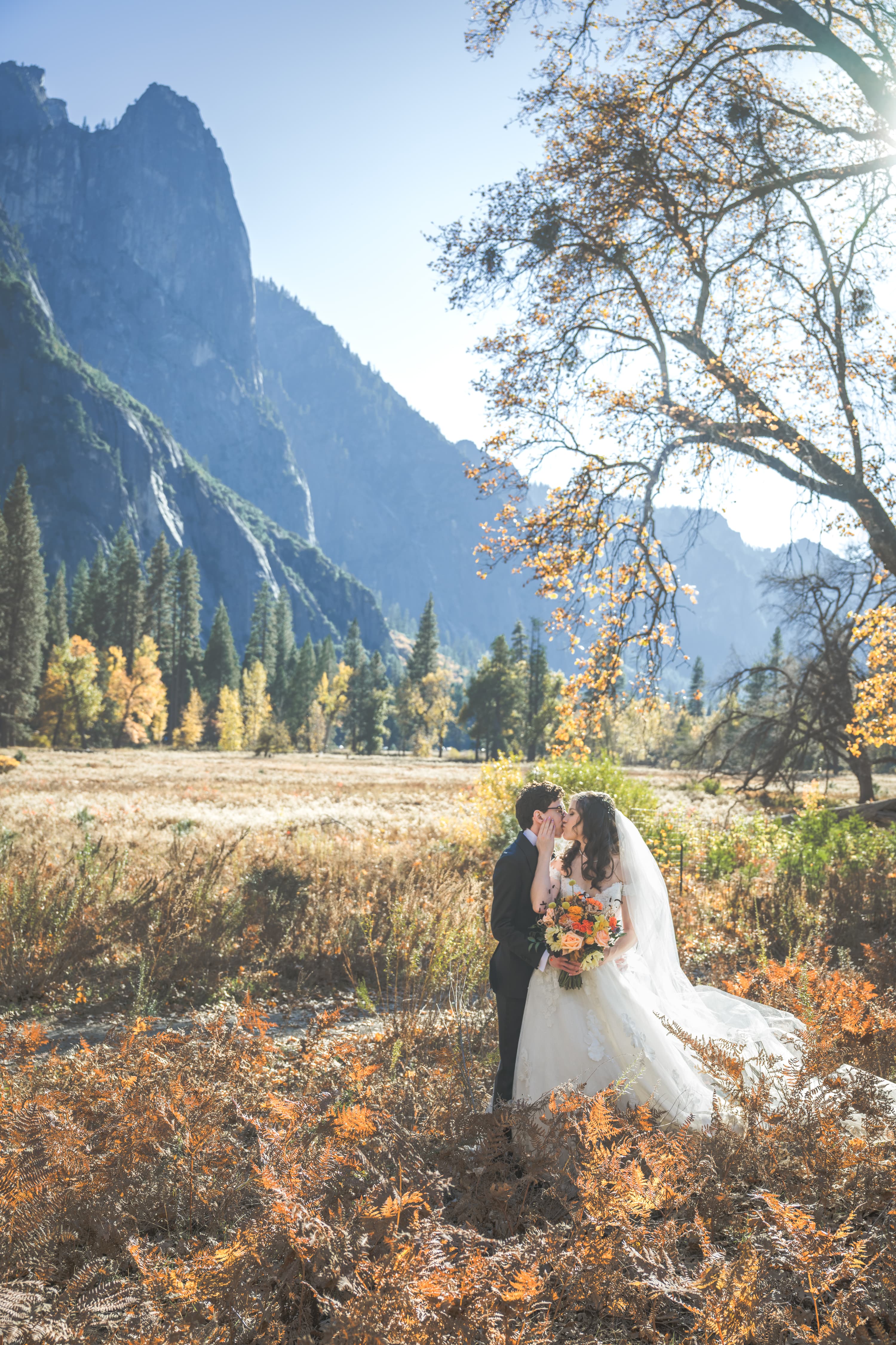 Adam and Steph wedding in Yosemite — couple embracing at golden hour