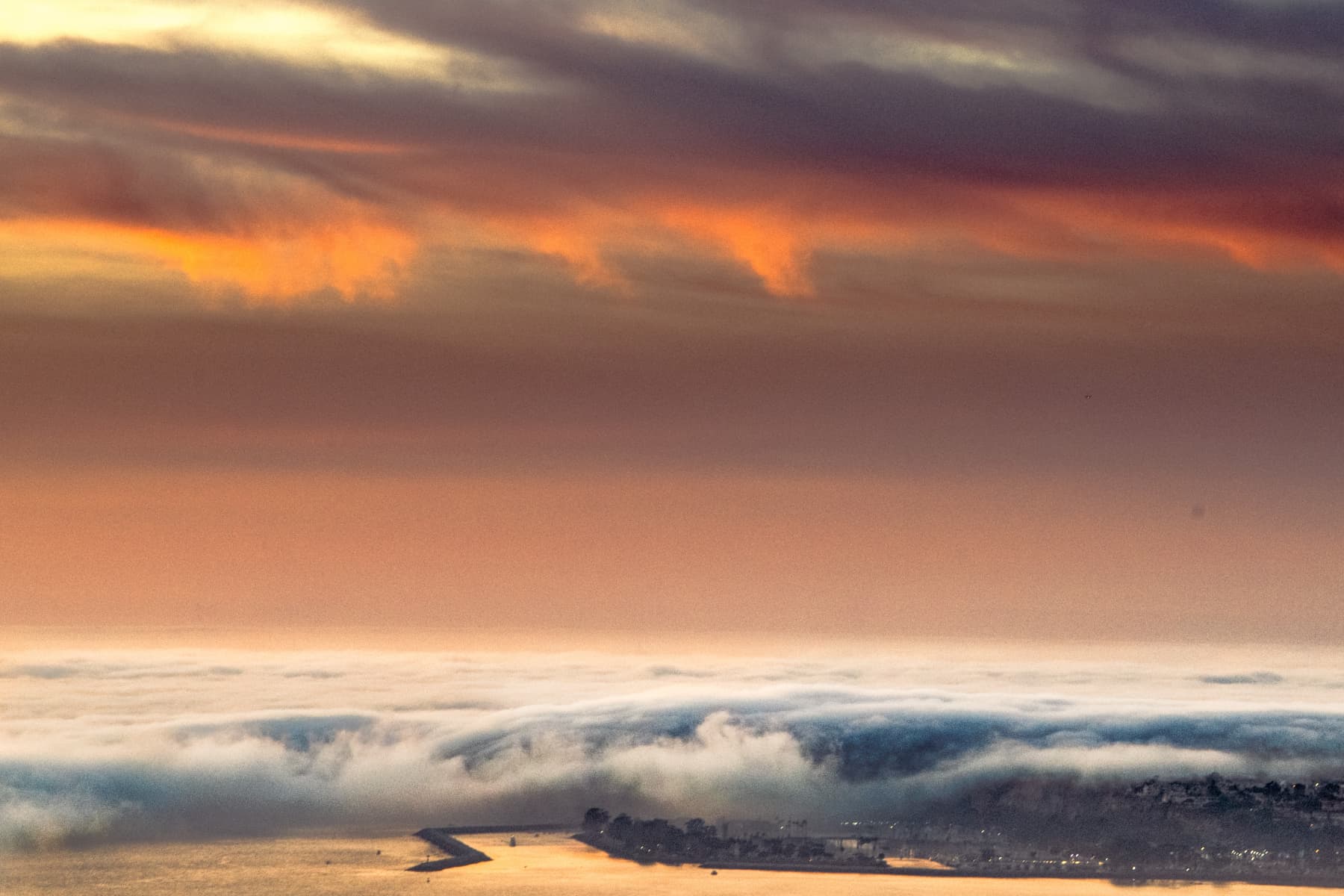 Mountain sunrise with dramatic cloud formations