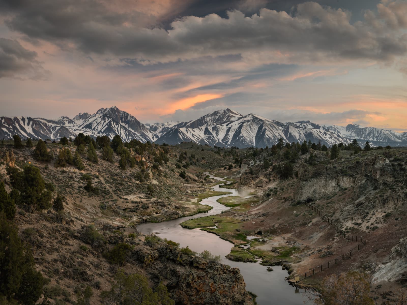 Panoramic landscape photograph of alpine mountains